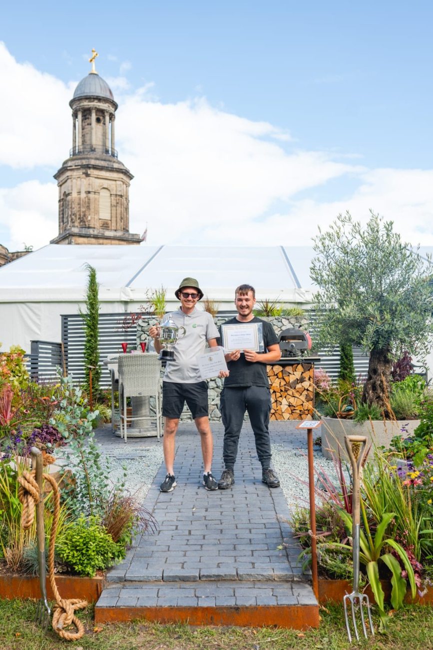 CG Landscape and Maintenance team at a flower show