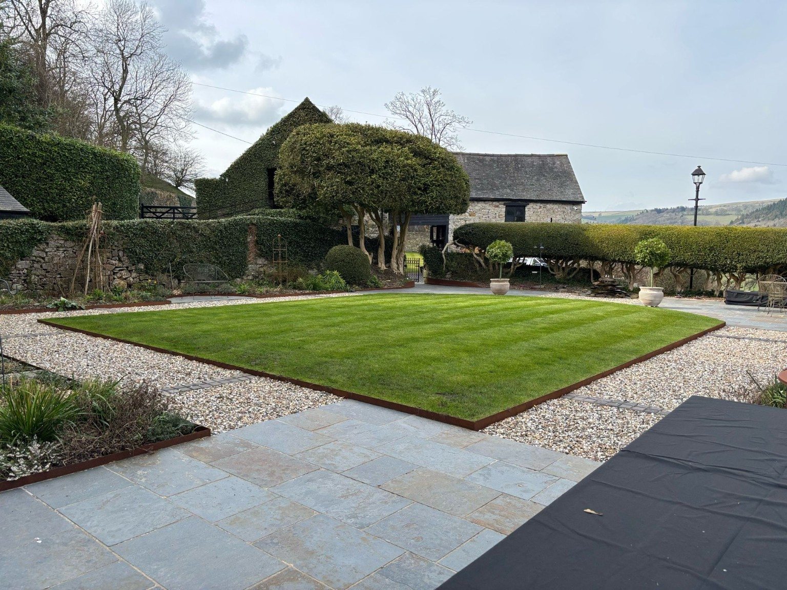 Garden paving and lawn